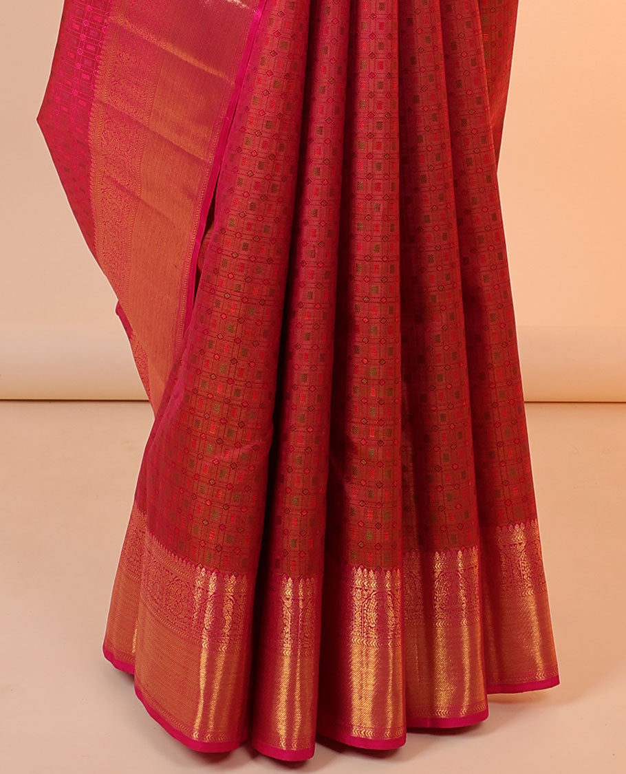 Orange embossed silksaree,contrast jaal design pallu & border of thilakam mokku,kathir,mayil & zari stripes