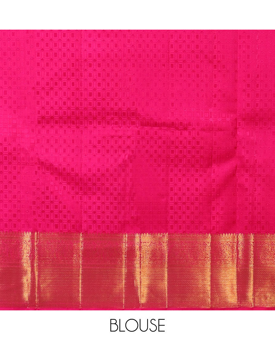 Orange embossed silksaree,contrast jaal design pallu & border of thilakam mokku,kathir,mayil & zari stripes