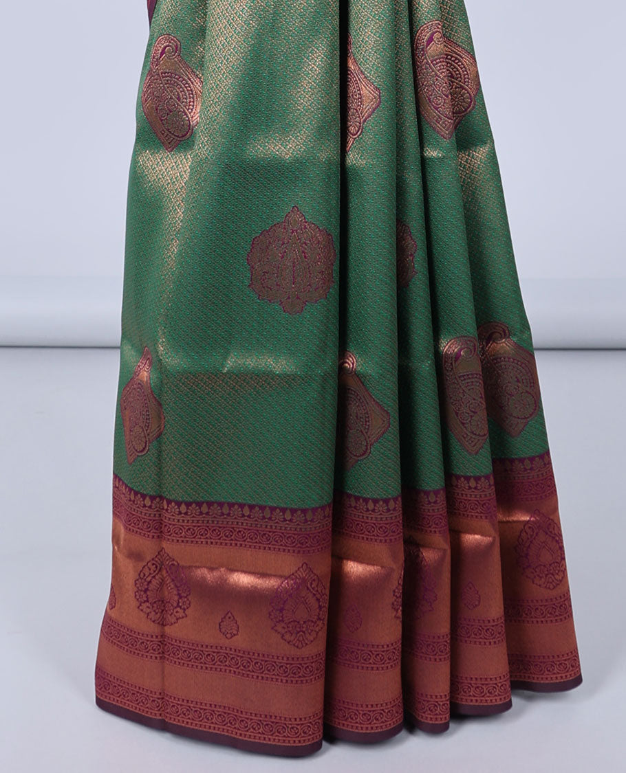 Green jacquard butter silk saree, contrast zari design border & pallu of intricate zari designs