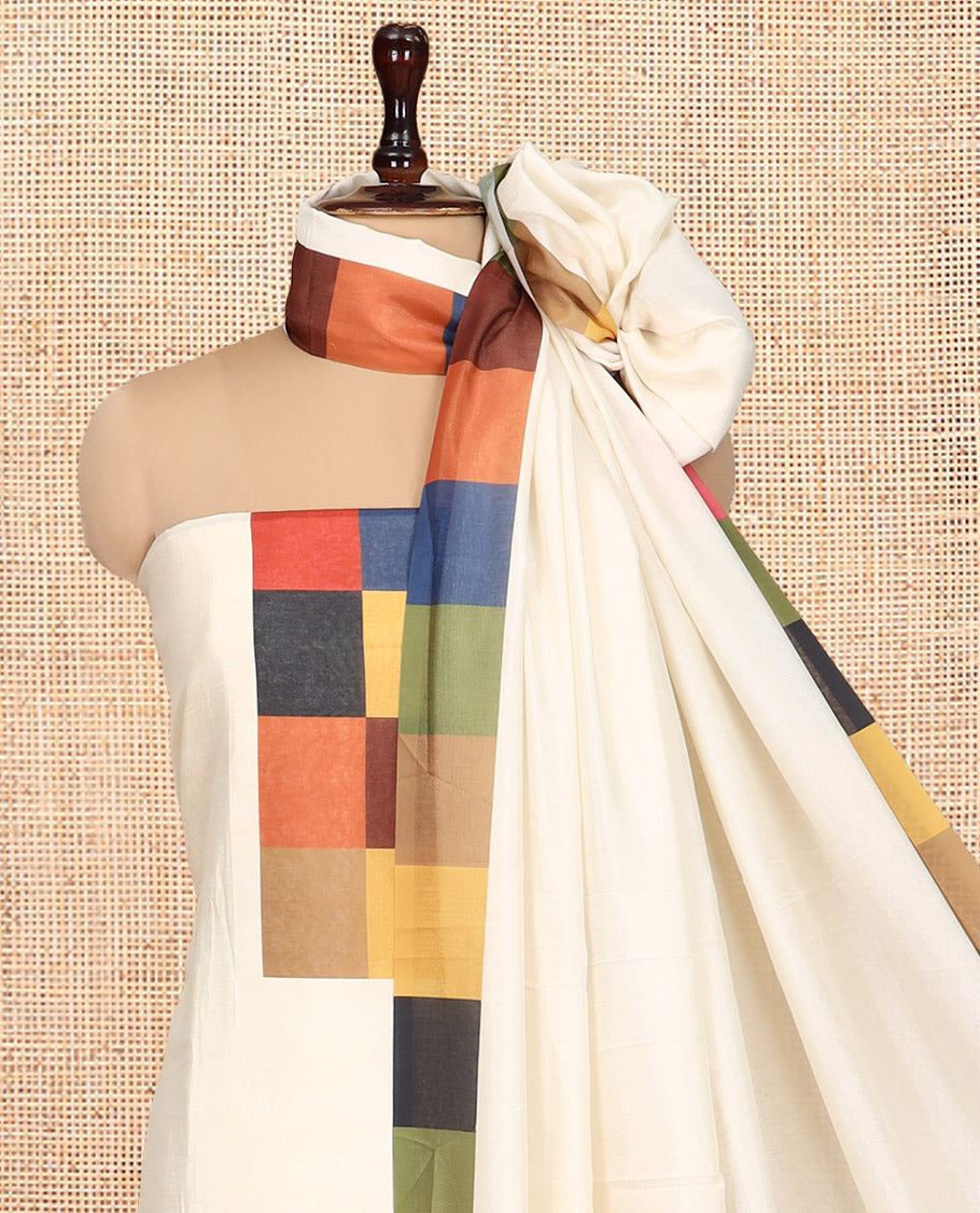 Cream Semi-Silk Material Churidar, Adorned with Multi-Color Checked Top, a Plain Bottom, a Checked Bordered Plain Dupatta