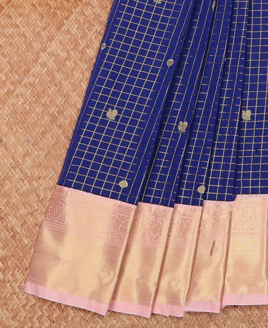 Blue Budget Silk Saree Gleamed Up with Peacock Chakram Buttas and Micro Checks, Complemented by a Contrast Traditional Zari Motifs Border, Pallu Decked Up with Zari, and Paired with a Contrast Blouse