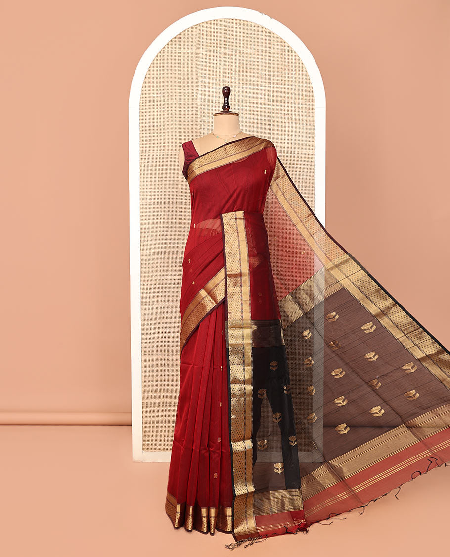 Red Maheshwari Cotton Saree, Accentuated with Zari Buttas All Over Its Body, Highlighted by a Traditional Zari Border, Captivating Contrast Pallu of Floral Designs, and Paired with a Contrast Blouse