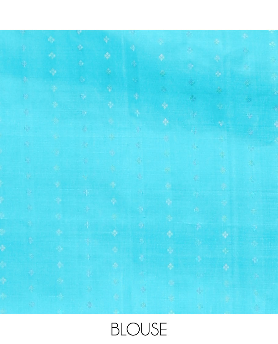 Borderless Blue Mayuri Soft Silk Saree, Sparsely Woven with Floral Buttas All Over Its Body, Sparsely Sparkled Pallu, and Paired with a Matching Blouse