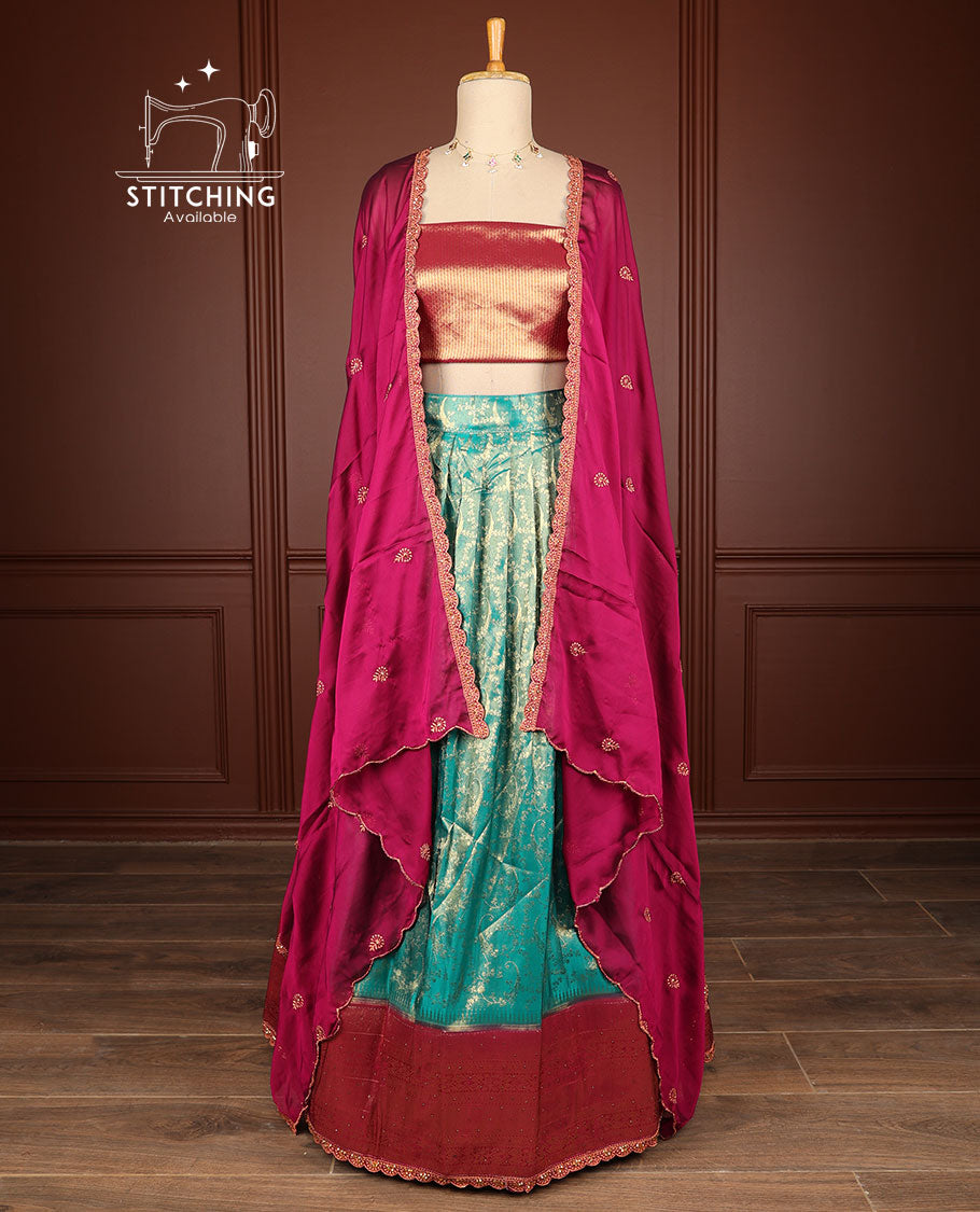 Blue floral jacquard half saree with contrast zari design border, zari design blouse & floral embroidery dhavani