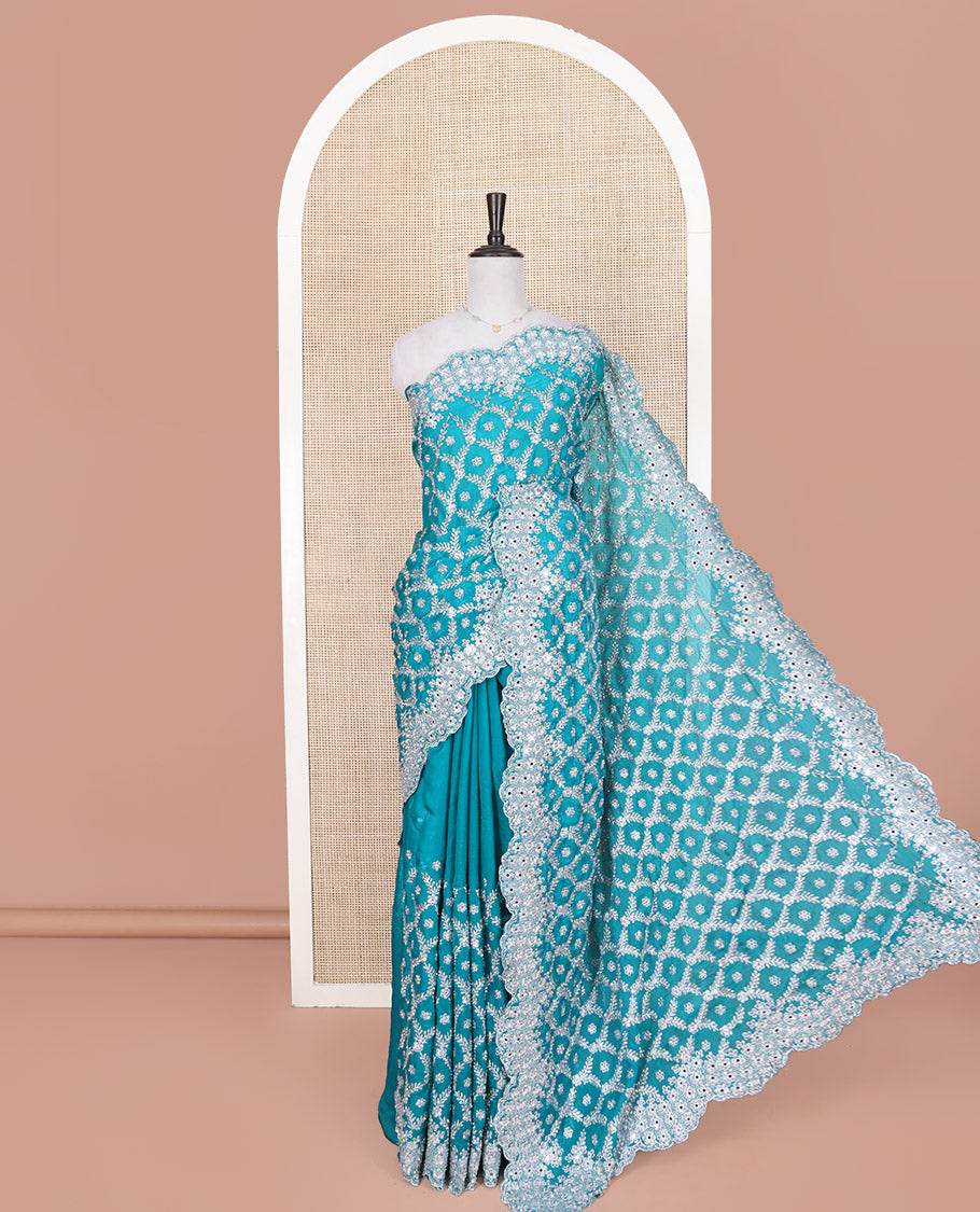 Blue Designer Saree, Masterfully Embroidered with Jaal Design on Its Body, Highlighted by a Scallop Embroidered Border, Embroidered Pallu, and Paired with a Matching Embroidered Blouse