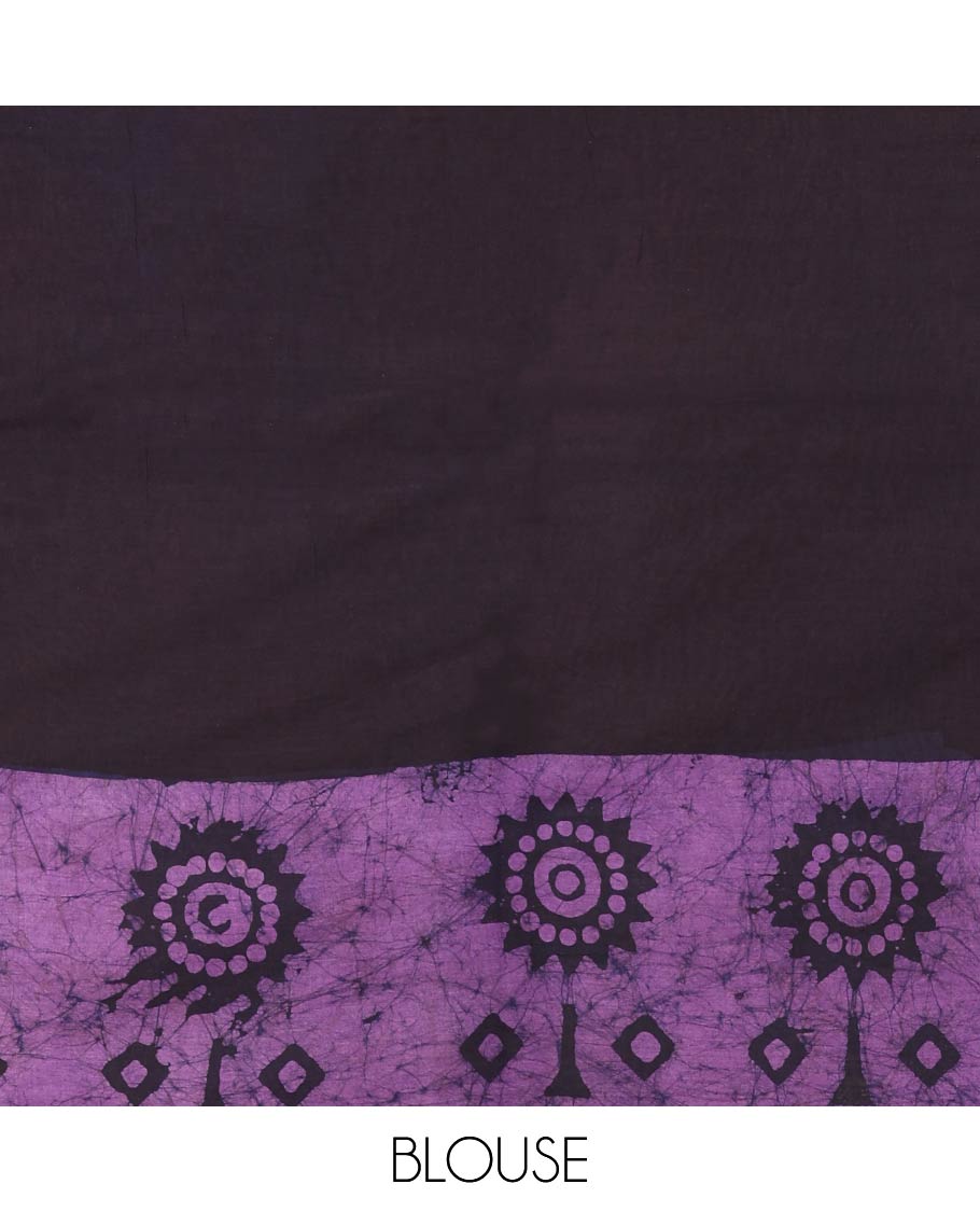 Brown Mul Cotton Saree Adorned with Batik-Style Floral Motifs Print, Featuring a Batik-Style Geometric Printed Border, Pallu Mirrors the Same Print, and Paired with a Matching Blouse