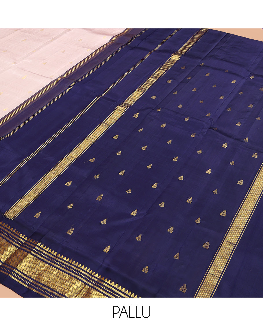 Beige Kanchipuram Silk Saree, Elevated with Zari Buttas, a Contrast One-Sided Border of Thazhampoo, Rekku, Banaras and Mayil Kann Design, Zari Design Pallu, and No Blouse