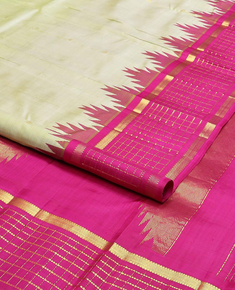 Pale green zari buttas kanchipuram silk saree, contrast one-sided thazampoo rekku muthu kattam border & pallu of zari stripes & thazampoo rekku
