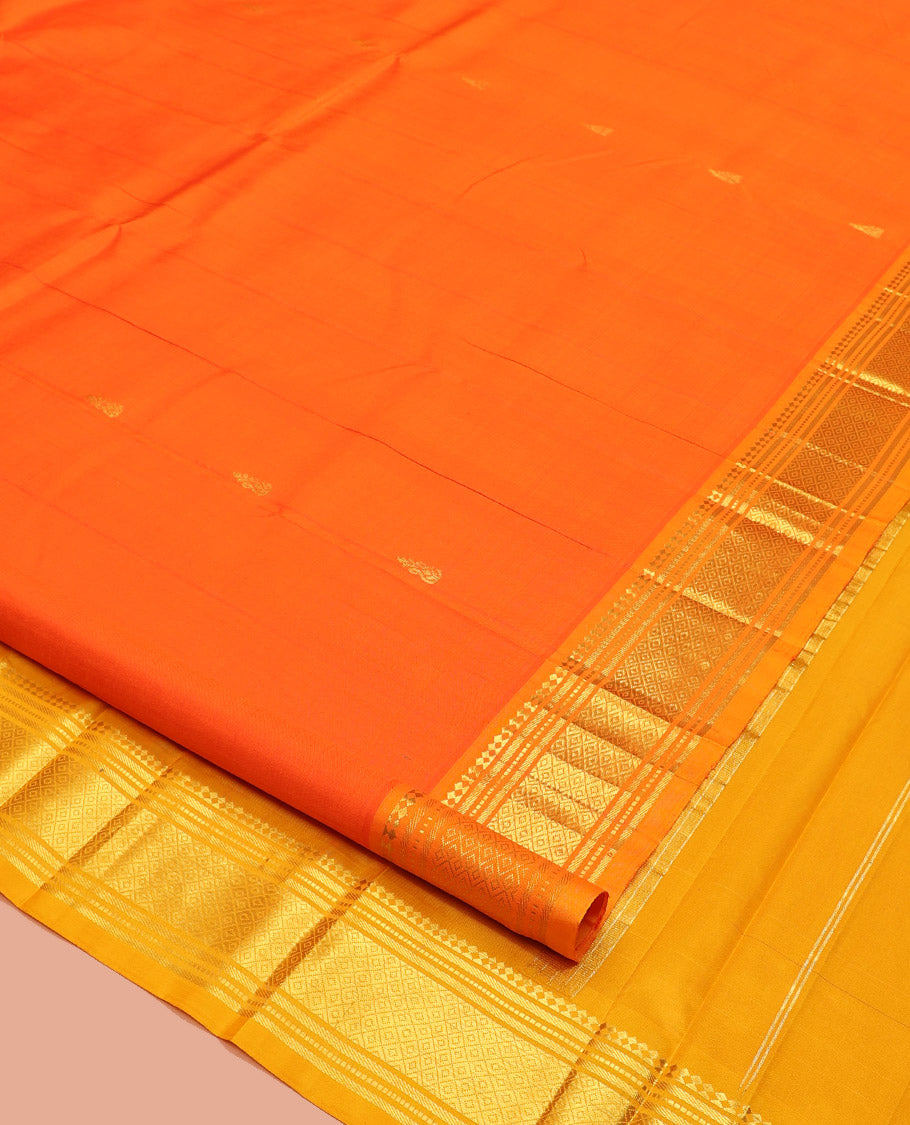 Orange Kanchipuram Silk Saree, Embellished with Zari Buttas, Contrast One-Sided Border of Paneer Sombu, Banaras, Muthu, and Mayil Kann Design, Zari Design Pallu, and No Blouse