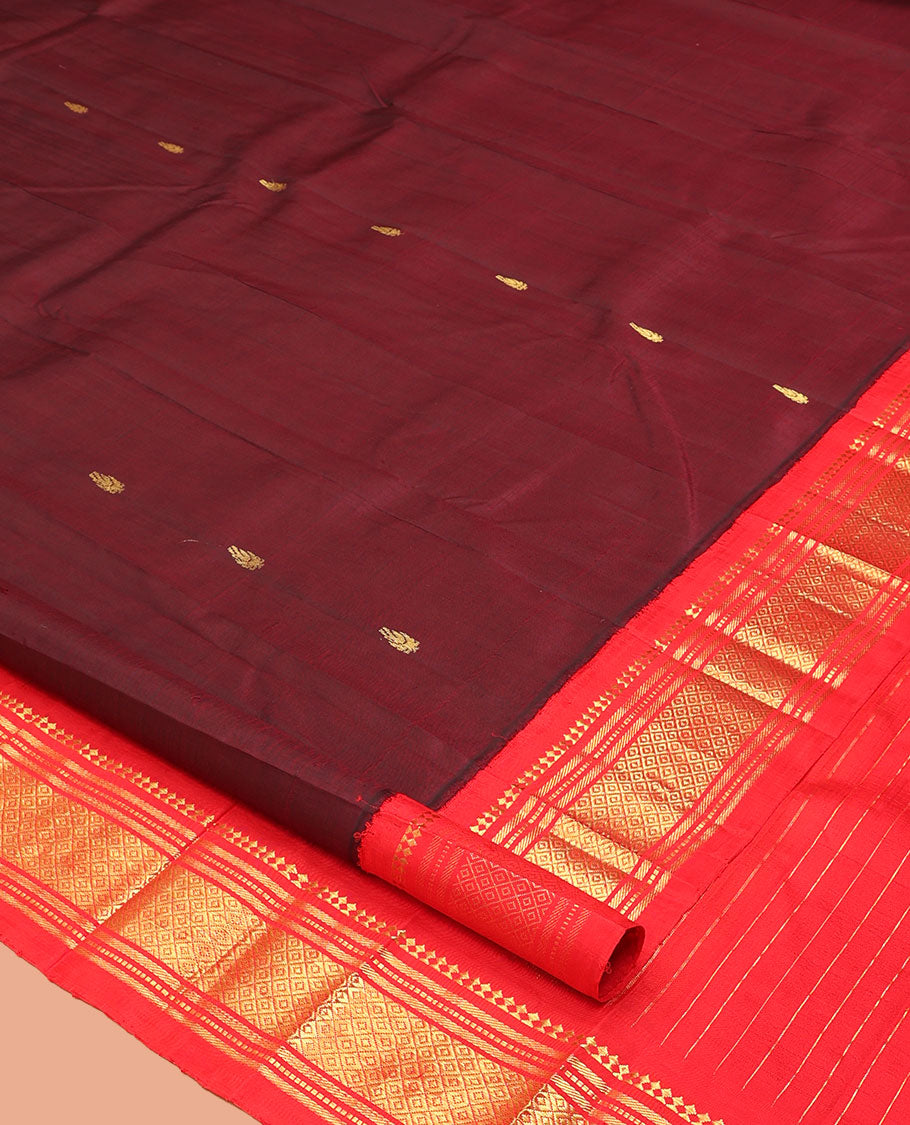 Maroon Kanchipuram Silk Saree, Woven with Zari Buttas, a Contrast One-Sided Korvai Border of Panner Sombu, Banaras, Muthu, and Mayil Kann Designs, a Zari Design Pallu, and No Blouse