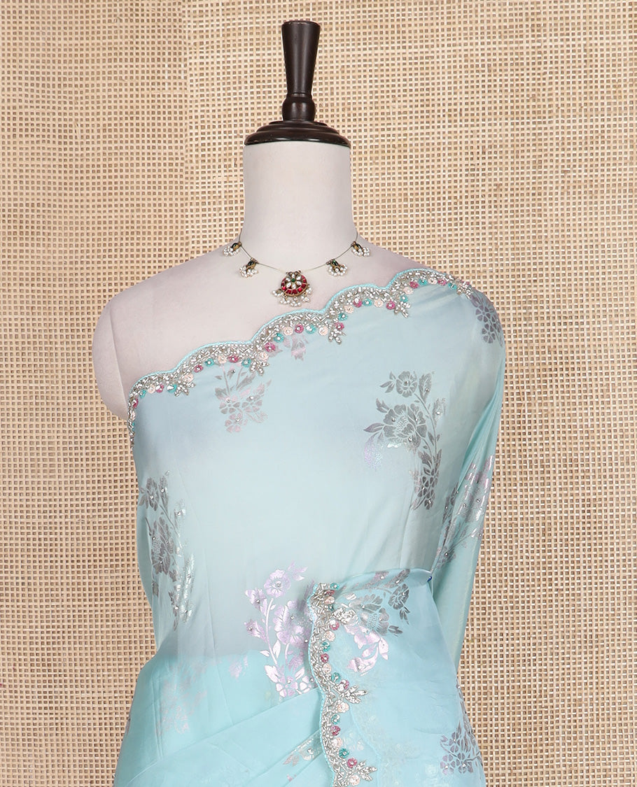 Powder blue floral motifs foil printed designer saree, scallop floral theme embroidered border