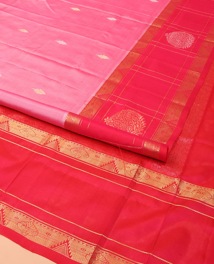 Pink Uppada Silk Saree Detailed with Zari Buttas All Over Its Body, Complemented by a Contrast Border of Traditional Zari Designs, Sparsely Sparkled Pallu of Floral-Paisley Designs, and Paired with a Contrast Blouse