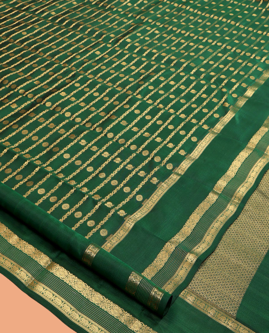 Green Vasundhara Lite Silk Mix Saree, Mesmerized with Zari Buttas and Stripes, a Zari Rettai Pettu Border of Rekku, Muthu, Mayil, Kodi Visiry, and Yaanai, Grand Pallu, and a Contrast Blouse