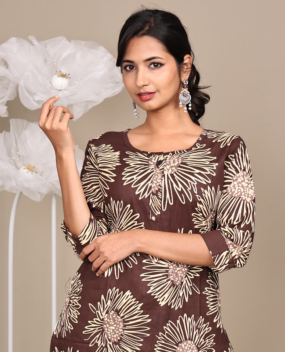Brown Floral Printed Below-Knee-Length Cotton Kurti, Featuring a Round Neckline, 3/4 Sleeves, and a Straight-Cut Length