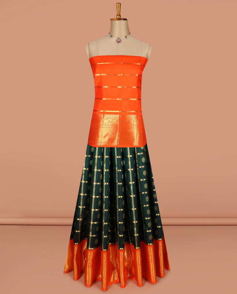 Green pure-silk half-saree, chakram butta enclosed checked skirt, contrast kodi visiry and mayil kann border, zari design blouse, and manga butta enclosed jaal dhavani