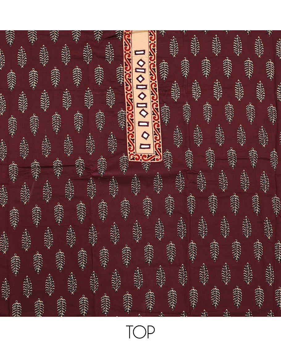 Maroon Cotton Material Chudidar Set, Decorated with Unique Motifs Block Printed on Its Cotton Top, a Plain Cotton Bottom, and Paired with an Intricately Block Printed Cotton Dupatta