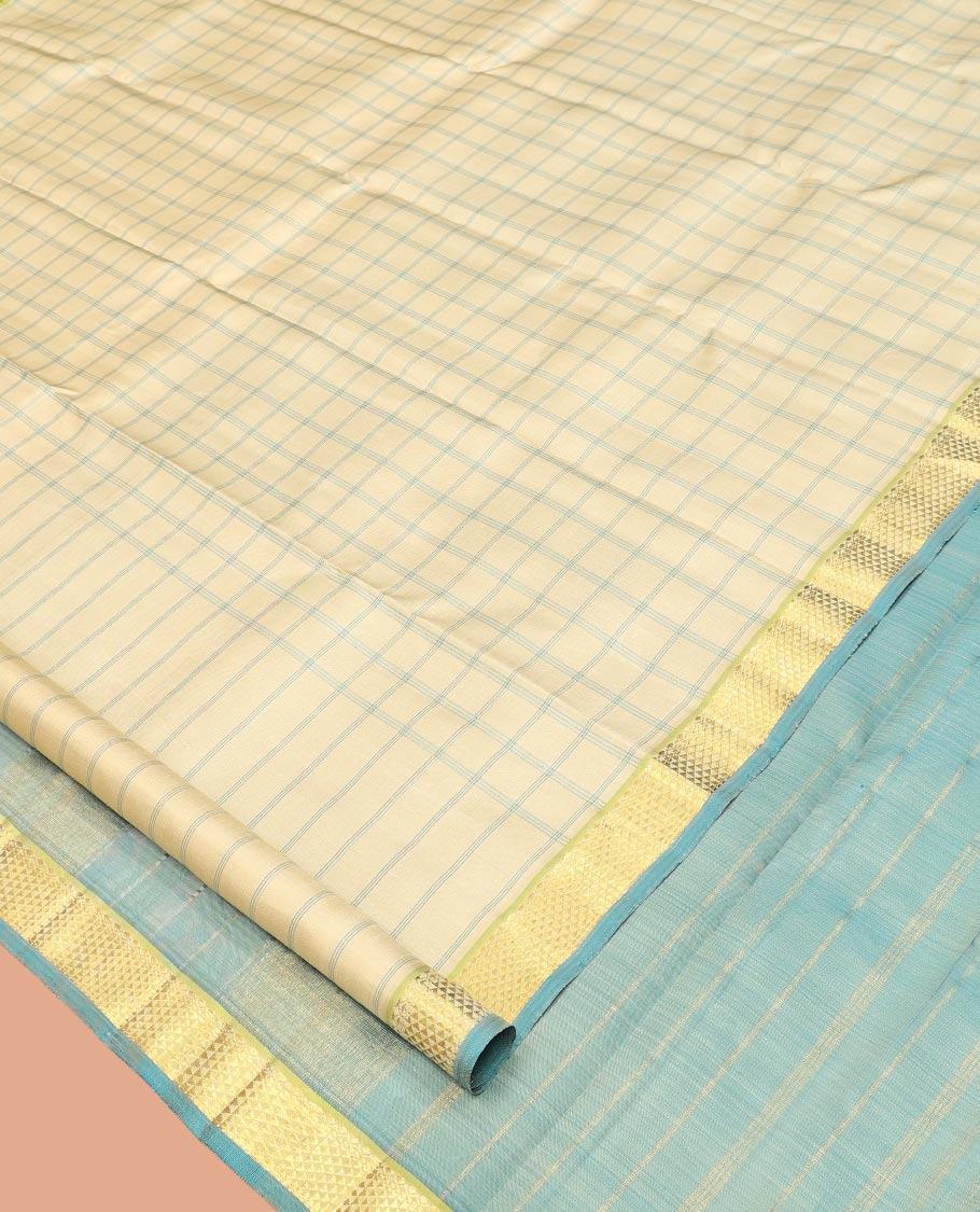 Sandal Kanchipuram Silk Saree, Styled with Checks, Complemented by Contrast Ara Maadam Border, Zari Striped Pallu, and Contrast Blouse