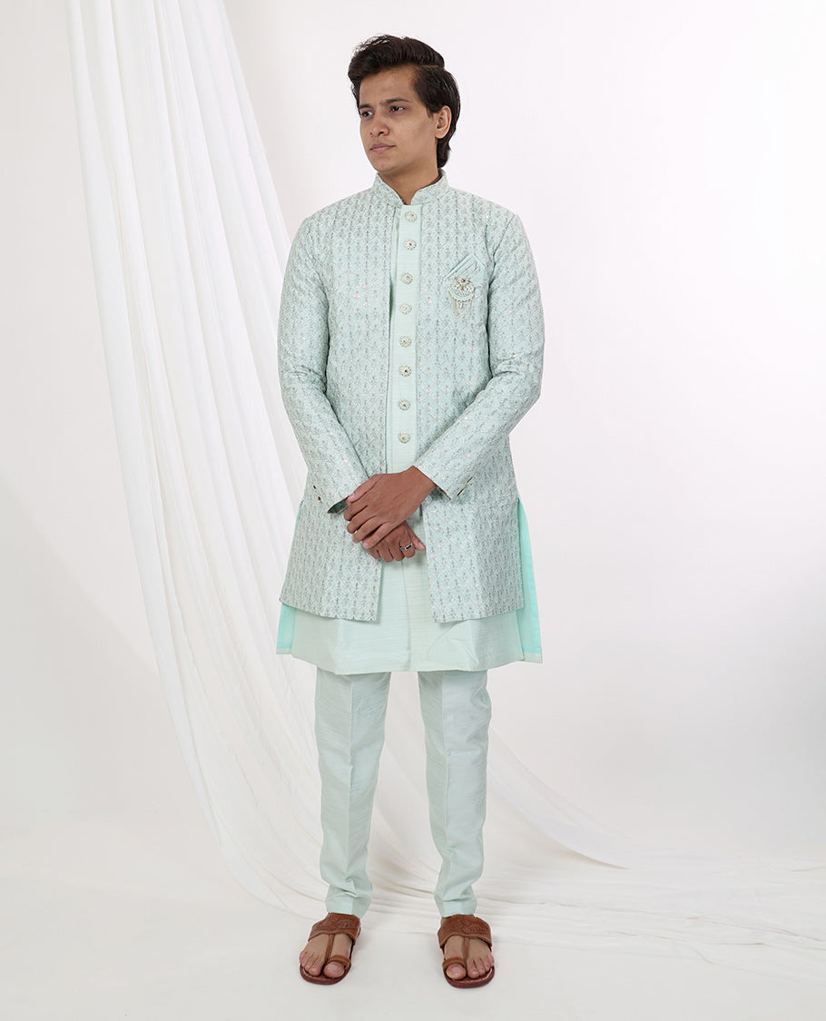 Light blue floral thread embroidery with sequins work mandarin collar & full-sleeve long raw silk kurta