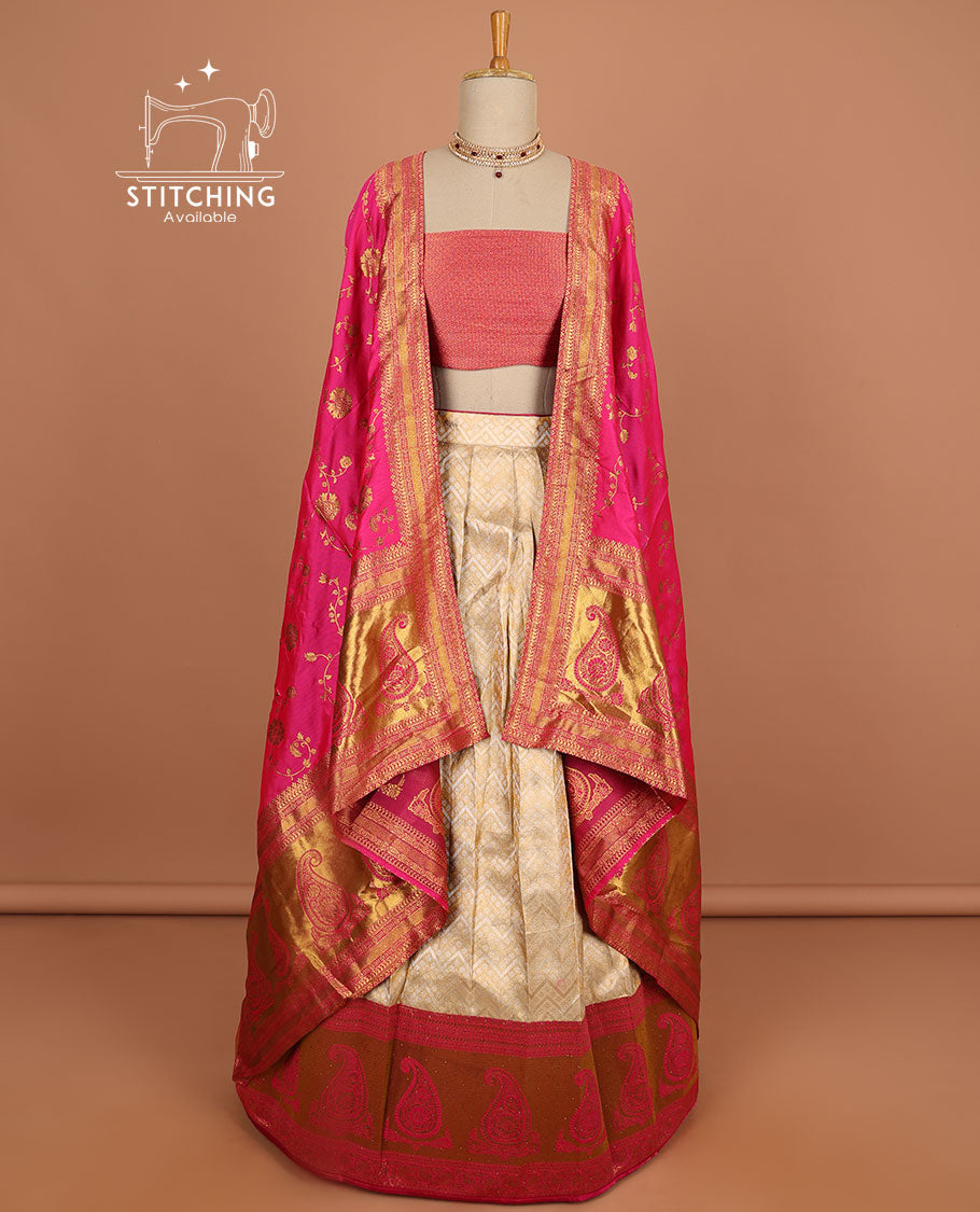 Cream geometric design half saree with contrast zari border, zari design blouse & pink floral zari design dhavani