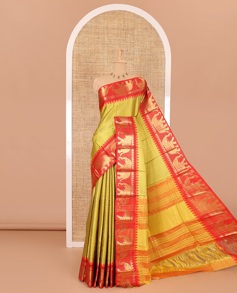 Yellow zari checked semi-taffeta saree, contrast satin temple border of elephant motifs, striped pallu, and a contrast striped blouse
