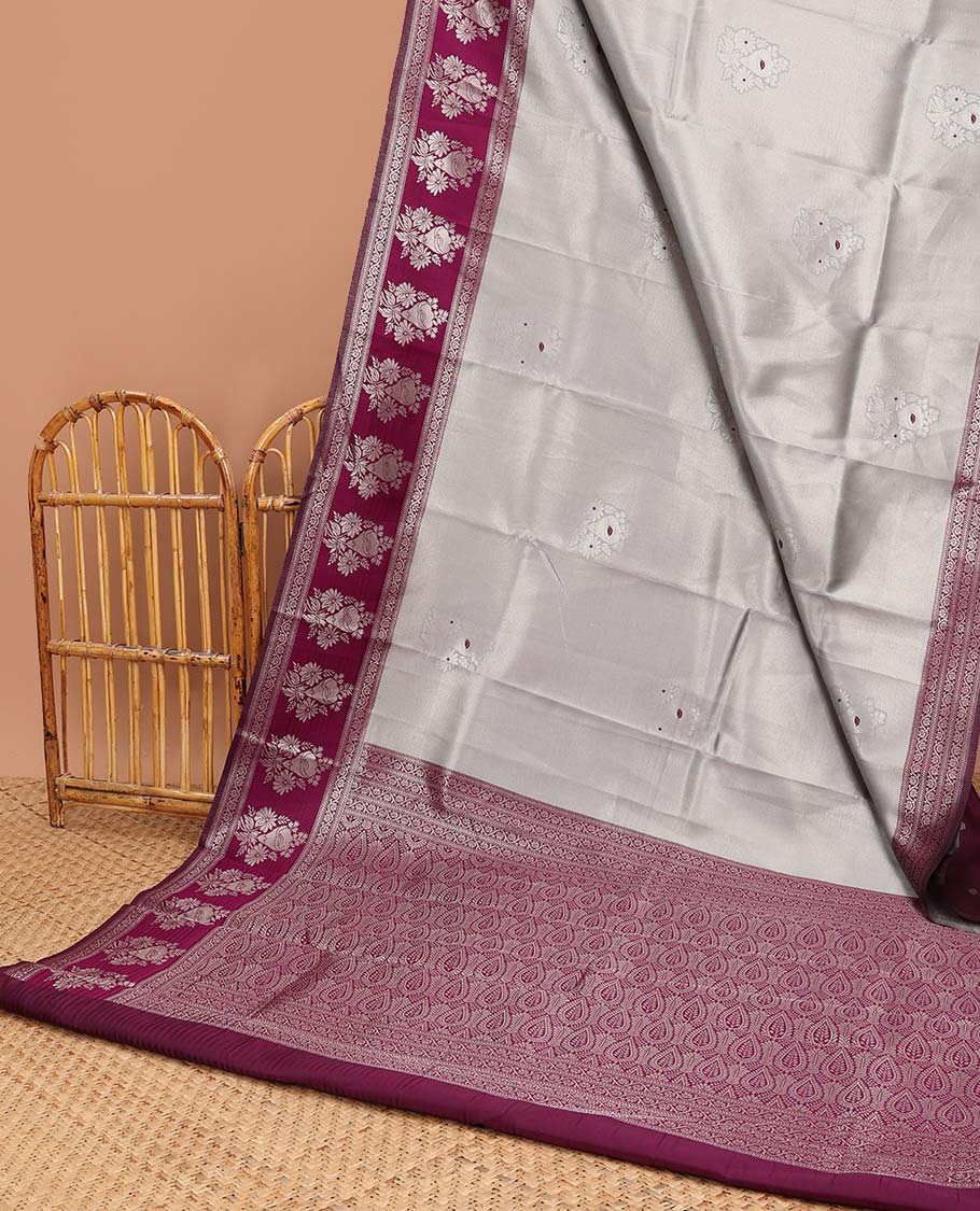 Light grey floral design litchi silk saree with contrast zari design border & floral jaal design pallu