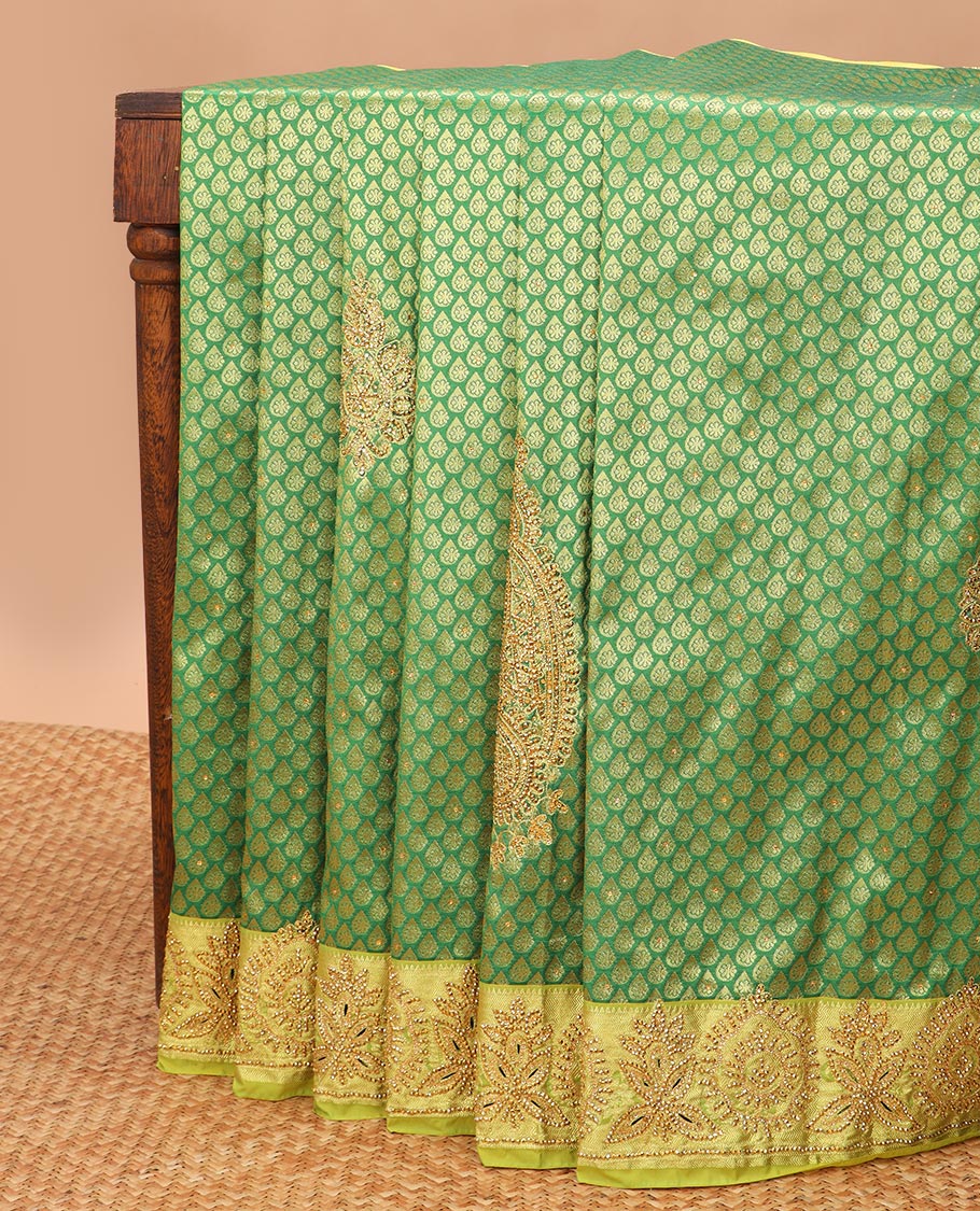 Green Orange leaf design vastrakala silk saree with stone work, contrast floral stone work scallop border & floral design in stone work pallu