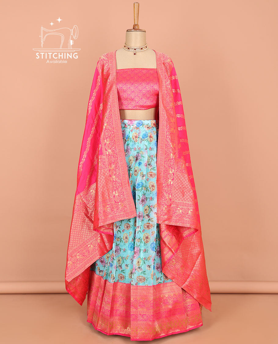 Blue floral printed art silk half saree, contrast traditional design border, jacquard blouse & intricate dhavani