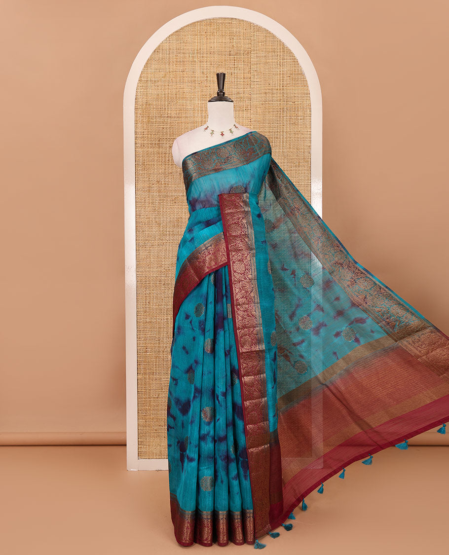 Rama blue all over zari butta with shibori-style printed jute cotton saree, contrast zari border, zari line weaving pallu & contrast blouse