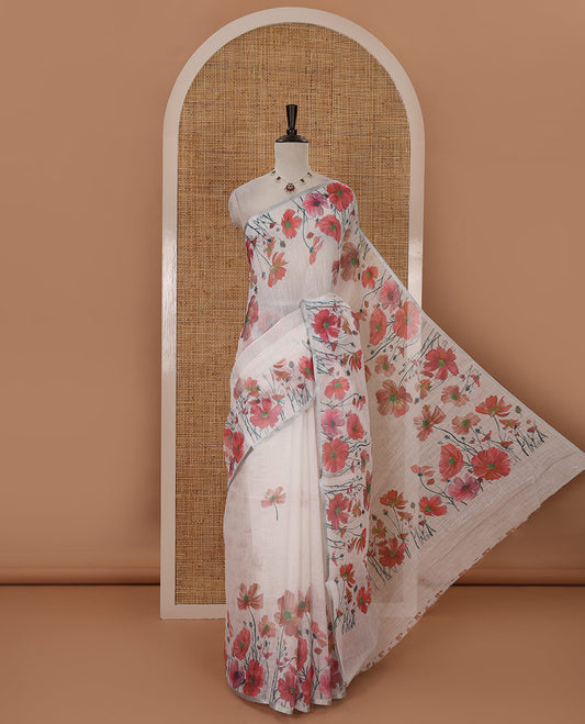White-base poppy-style pink-color floral motifs printed linen saree, piping zari border, pallu steeped with floral print & floral matching blouse