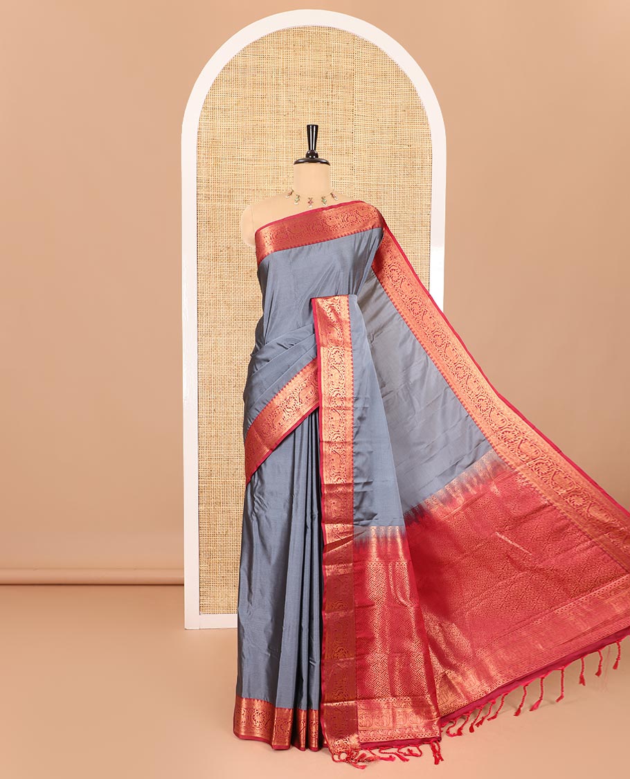 Grey plain luxury soft silk saree, contrast traditional temple zari border of elephant motifs, geometric zari pallu, and a contrast jacquard blouse