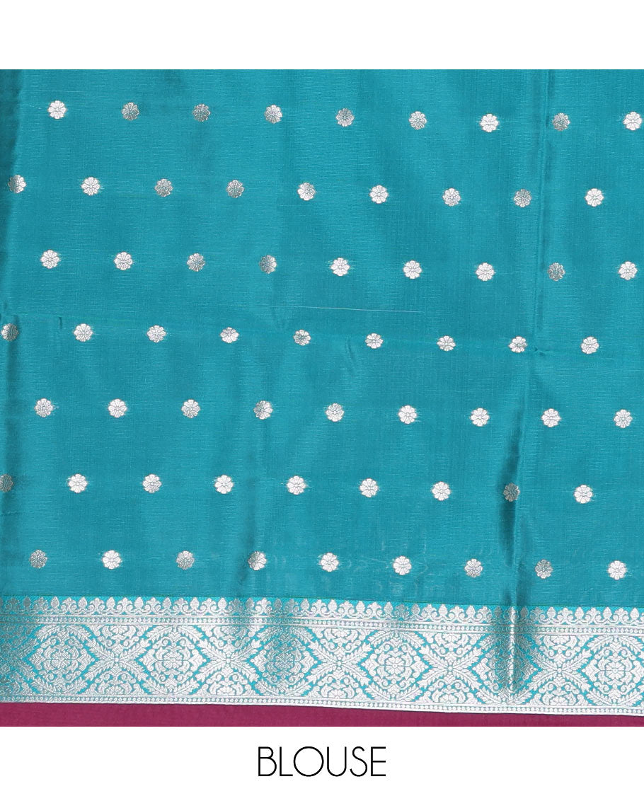 Purple-blue floral buttas elite soft silk saree, contrast floral buttas border, and pallu of Mughal-style intricate zari designs