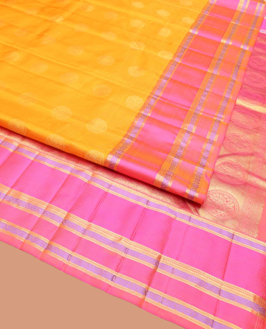 Yellow Vasundhara Silk Saree, Sparsely Woven with Stripes and Chakram Buttas on Its Body, Complemented by a Contrast Border of Rekku, Bentex, and Kodi Visiry Designs, Grand Jaal Design Pallu, and Paired with a Contrast Blouse