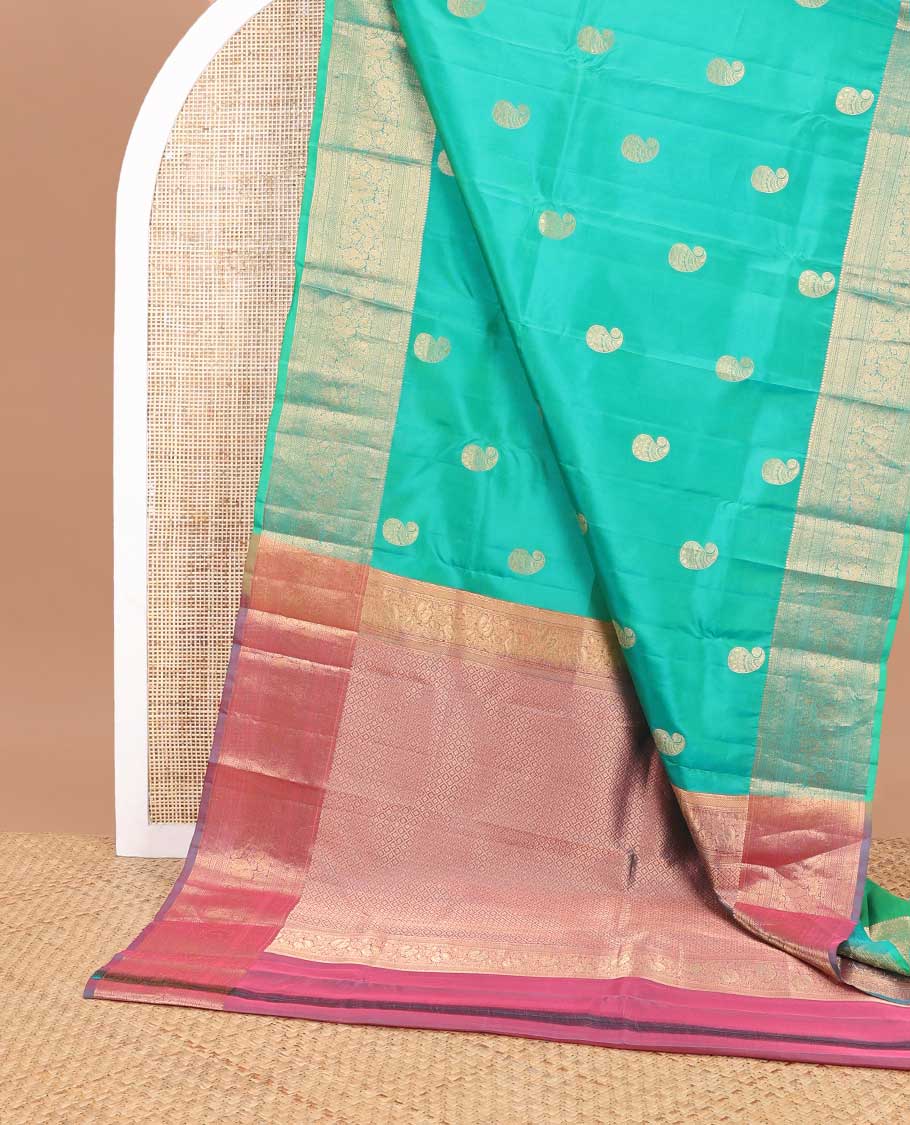 Sea blue manga design vasundhara elite silk saree with contrast intricate zari design border & checked floral design pallu