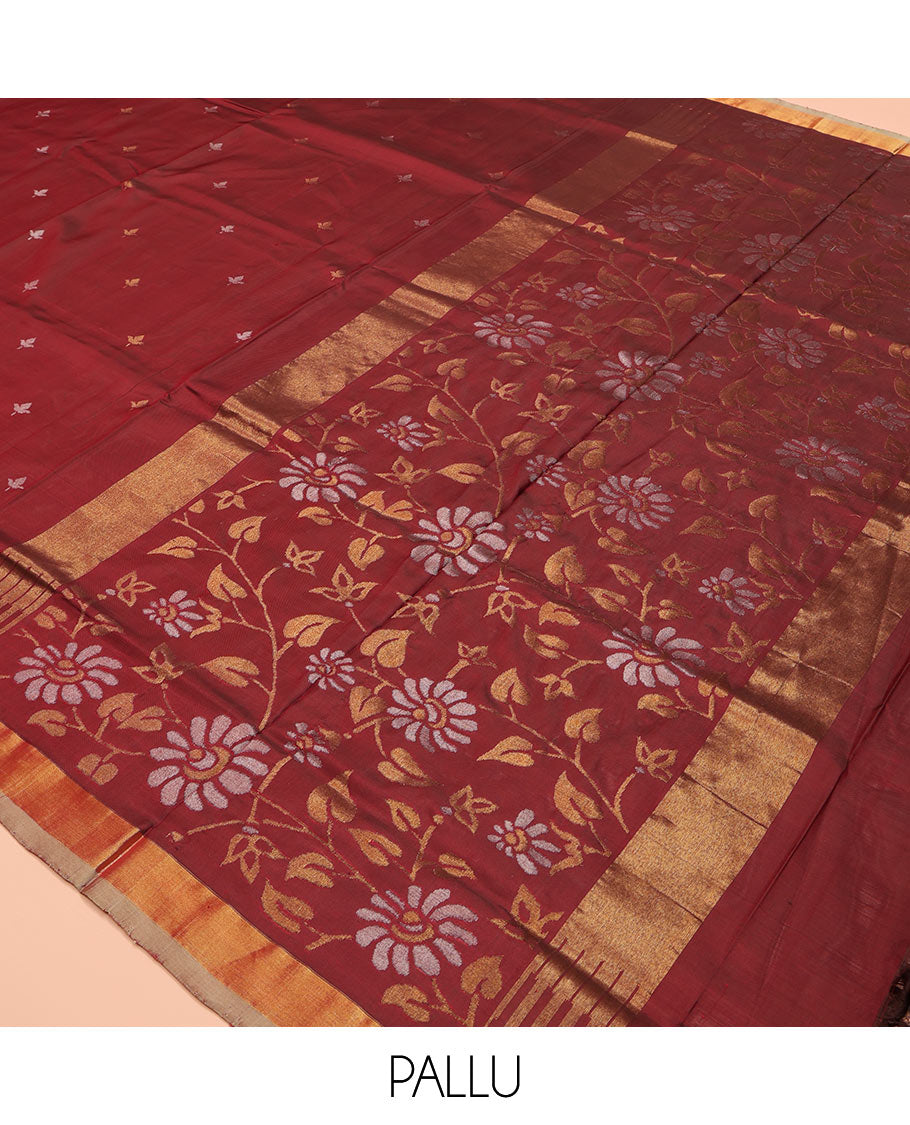 Maroon Uppada Silk Saree, Adorned with Zari Buttas All Over Its Body, Complemented by a Contrast Plain Border, Pallu Features Floral Jaal Designs, and Paired with a Matching Blouse