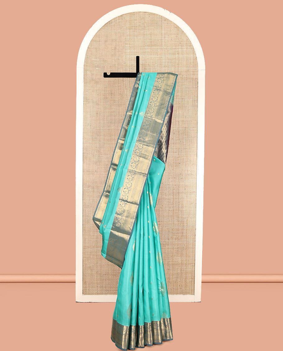Turquoise Vasundhara Lite Silk Mix Saree, Detailed with Zari Buttas, Complemented by a Contrast Border of Kodi Mayil, Muthu, Mayil Kann, and Kodi Visiry, Jaal Pallu, and a Contrast Blouse