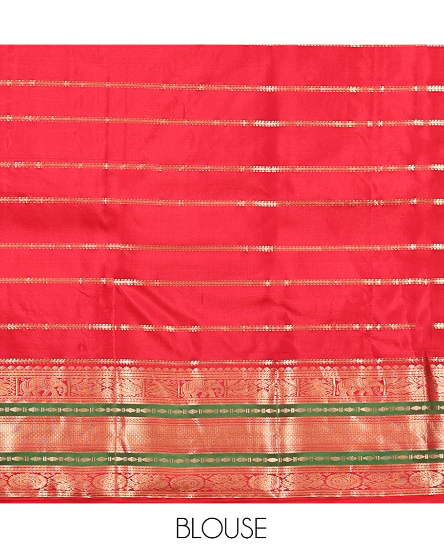 Blue Vasundhara Silk Saree, Accentuated with Zari Buttas and Stripes All Over Its Body, Complemented by a Contrast Border of Elephant, Mayil, and Chakram Designs, a Grand Pallu, and Paired with a Contrast Blouse