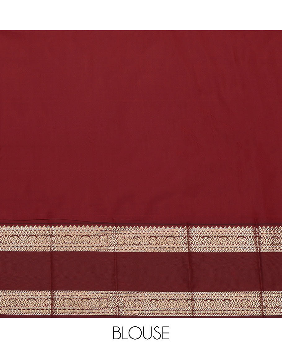 Orange Budget Silk Saree, Gleamed Up with Zari Stripes and Peacock Buttas on Its Body, Complemented by Contrast Traditional Zari Design Rettai Pettu Border, Opulently Embellished Pallu, and Paired with a Contrast Blouse