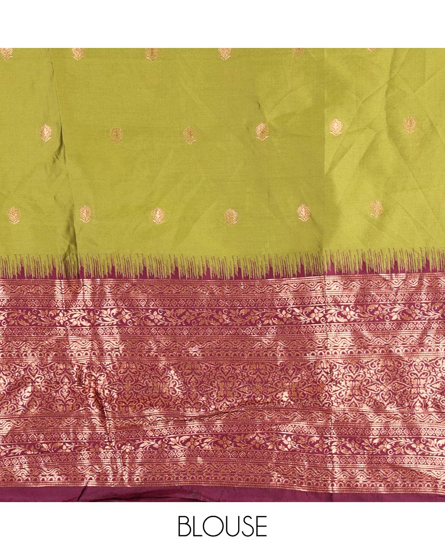Leaf green taffeta silk half saree, zari buttas with contrast purple traditional zari border, matching zari blouse, and contrast plain zari border dhavani