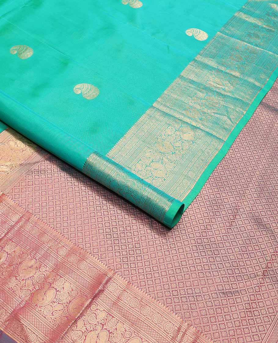 Sea blue manga design vasundhara elite silk saree with contrast intricate zari design border & checked floral design pallu