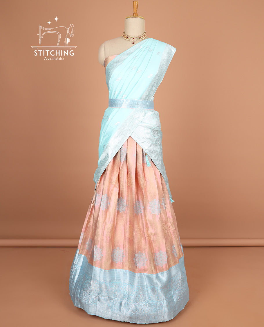 Light orange floral motifs half saree with contrast zari design border , zari design blouse & intricate zari design dhavani