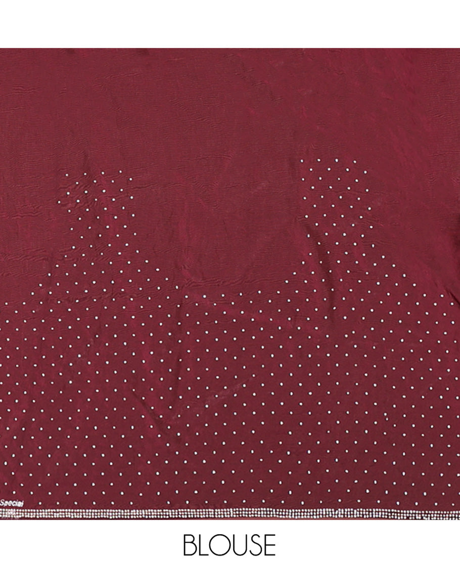 Wine Designer Saree, Scintillated with Stone Struck All Over Its Body, Highlighted by Intricate Stone Work Border, and Paired with a Matching Blouse