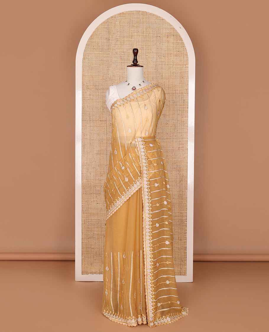Yellow striped and thilakam stone-thread embroidered designer saree, scallop embroidered border