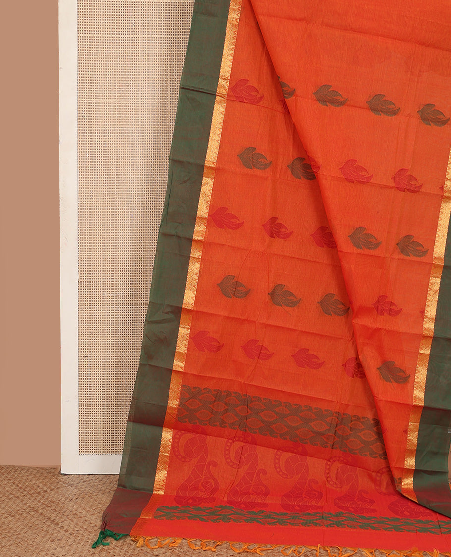 Orange leaf buttas kanchi cotton saree, contrast zari border, and pallu of intricate designs