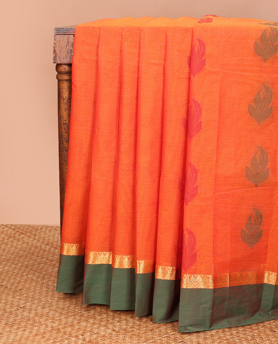 Orange leaf buttas kanchi cotton saree, contrast zari border, and pallu of intricate designs