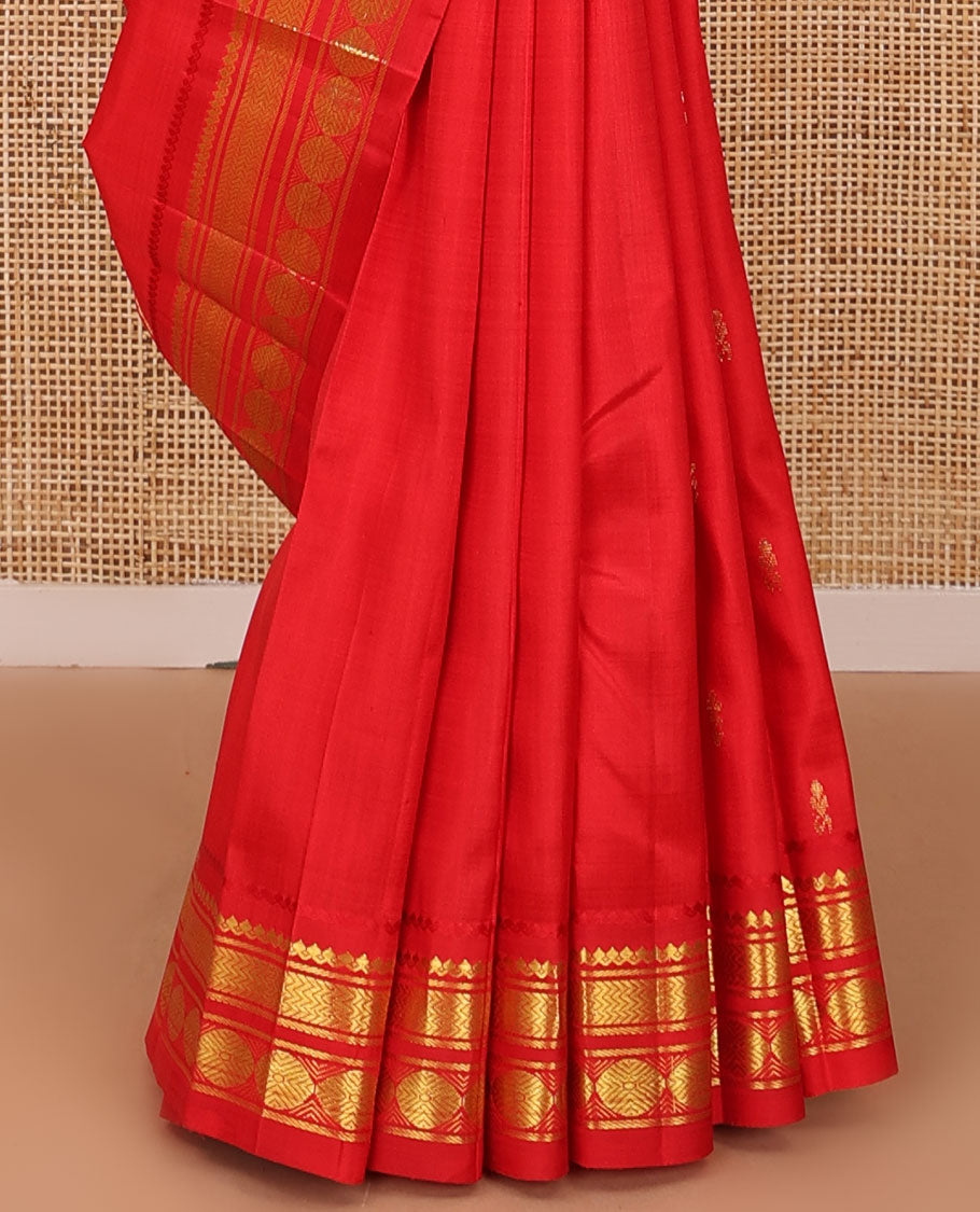 Red zari buttas woven Kanchipuram silk saree, zari one-sided border of thilakam mokku,banaras,vanki & poun designs & pallu of muthu stripes & zari buttas