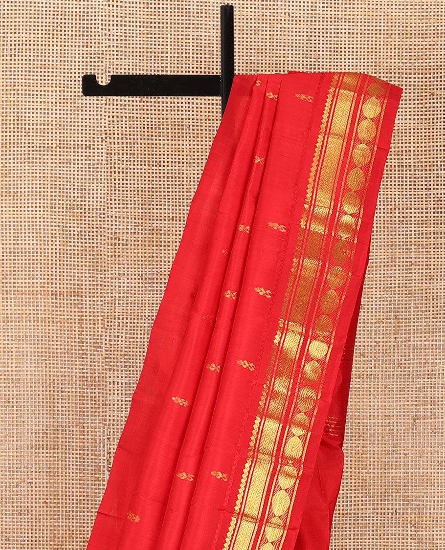Red zari buttas woven Kanchipuram silk saree, zari one-sided border of thilakam mokku,banaras,vanki & poun designs & pallu of muthu stripes & zari buttas