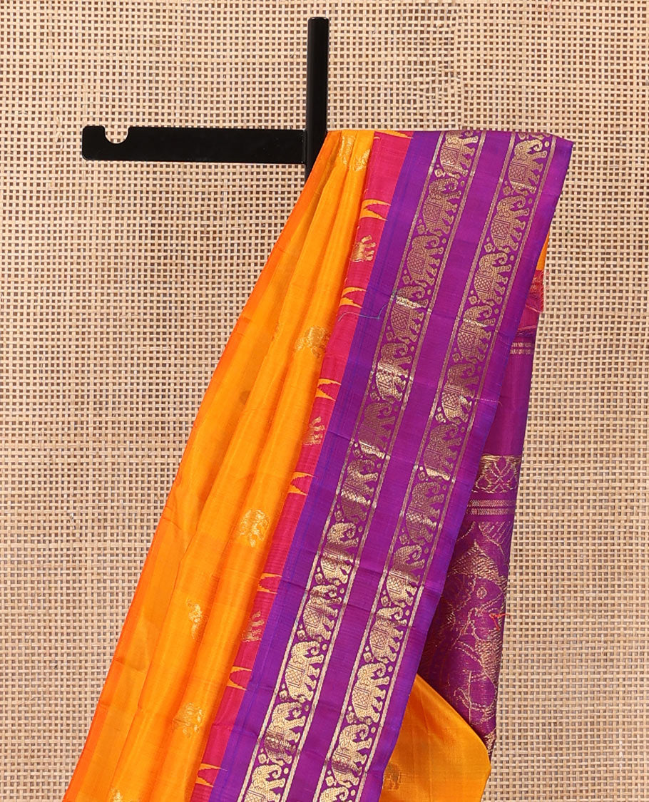 Orange yaanai zari buttas Kanchipuram silk saree, contrast one-sided thazampoo rekku rettai pettu border of yaanai motifs, and human motifs pallu