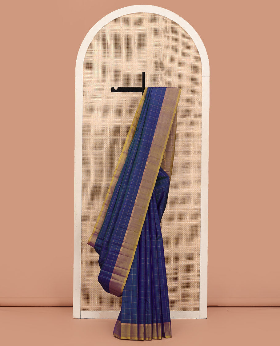 Blue Kanchipuram Silk Saree Delicately Woven with Checks, Complemented by a Contrast Border, Sparsely Zari Woven Pallu, and Paired with a Contrast Blouse