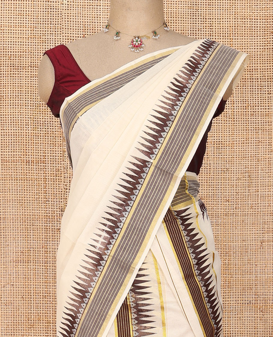 Cream plain Kerala mundu set with contrast temple striped border