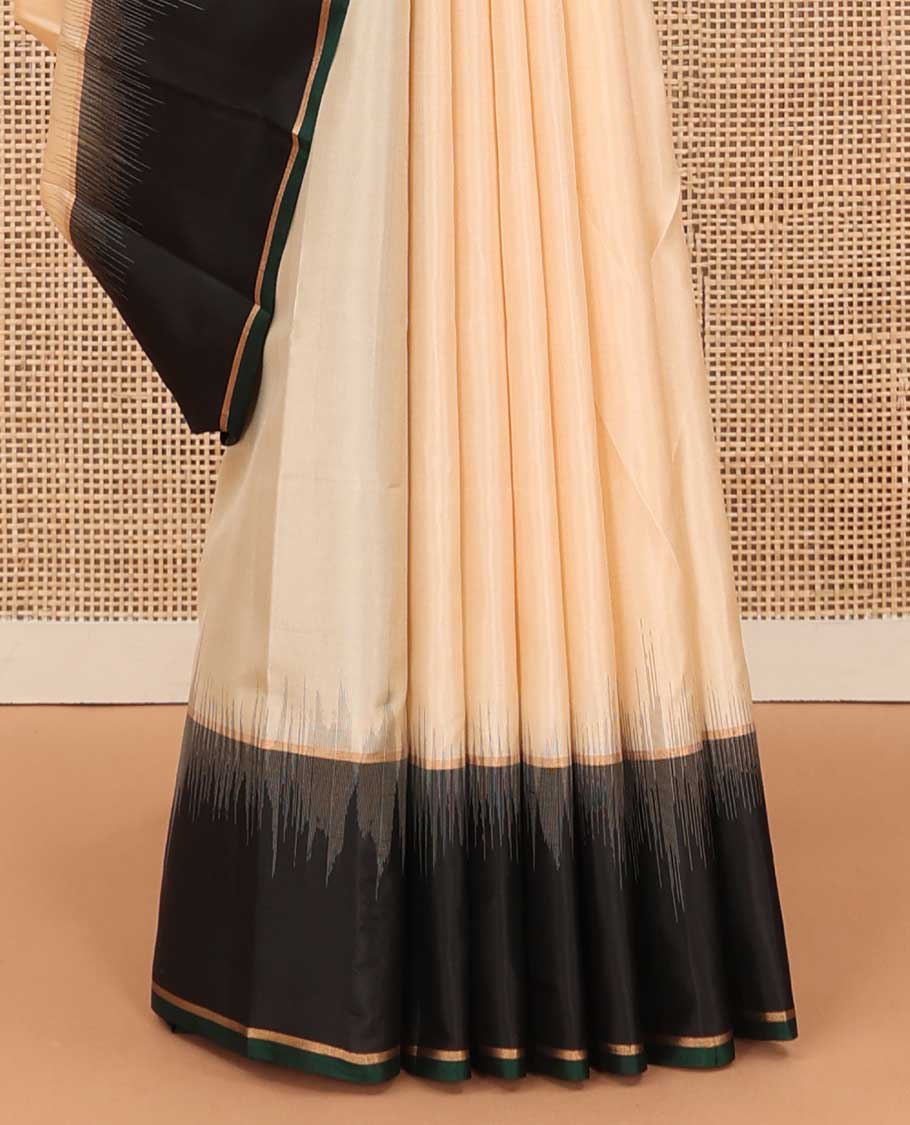 Cream soft silk saree, contrast zari border, and zari-rich pallu of temple and kodi rudraksham designs
